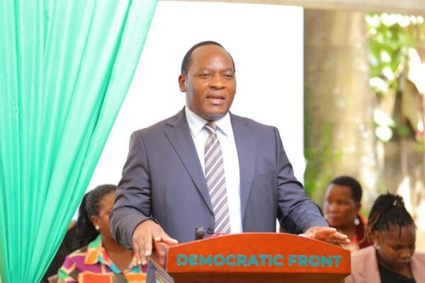 a man standing at a podium