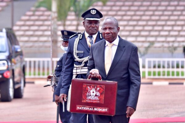 a man in a suit holding a briefcase