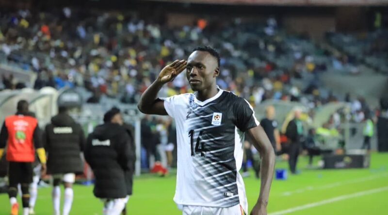 a man saluting with his hand